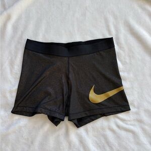 Nike Women's Athletic Shorts in Black and Gold